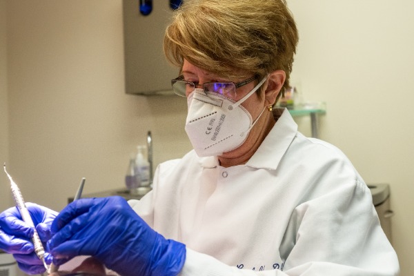 dental technician in the process of a dental checkup